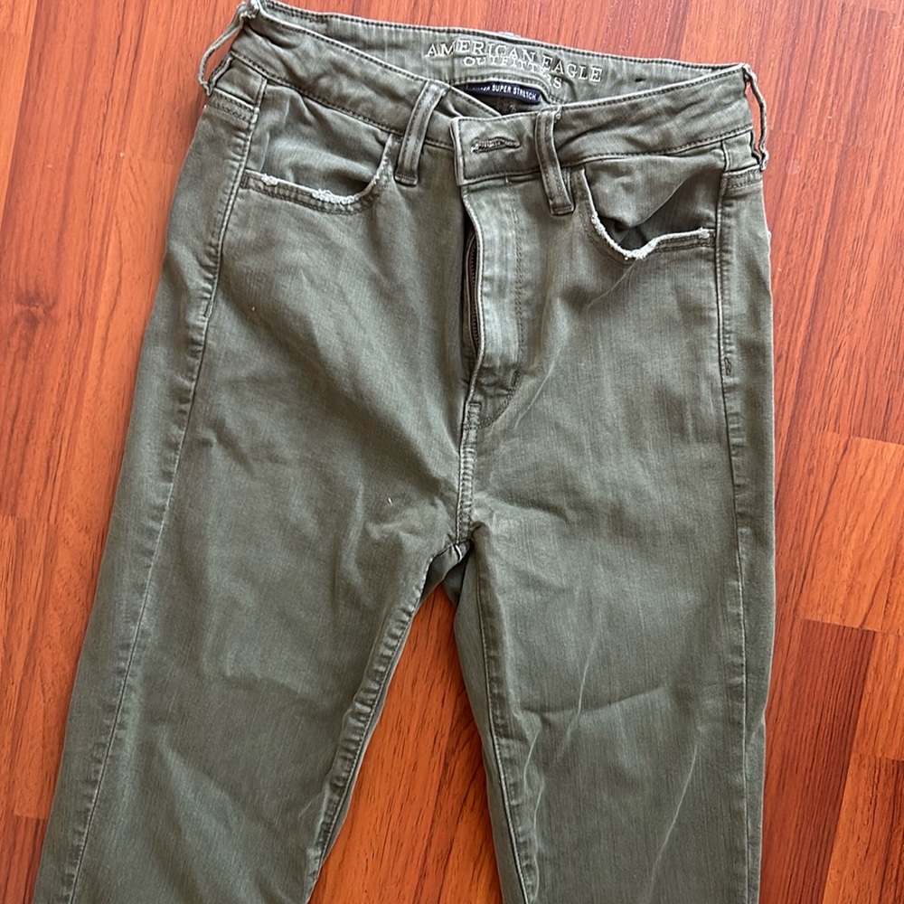Green skinny jeans